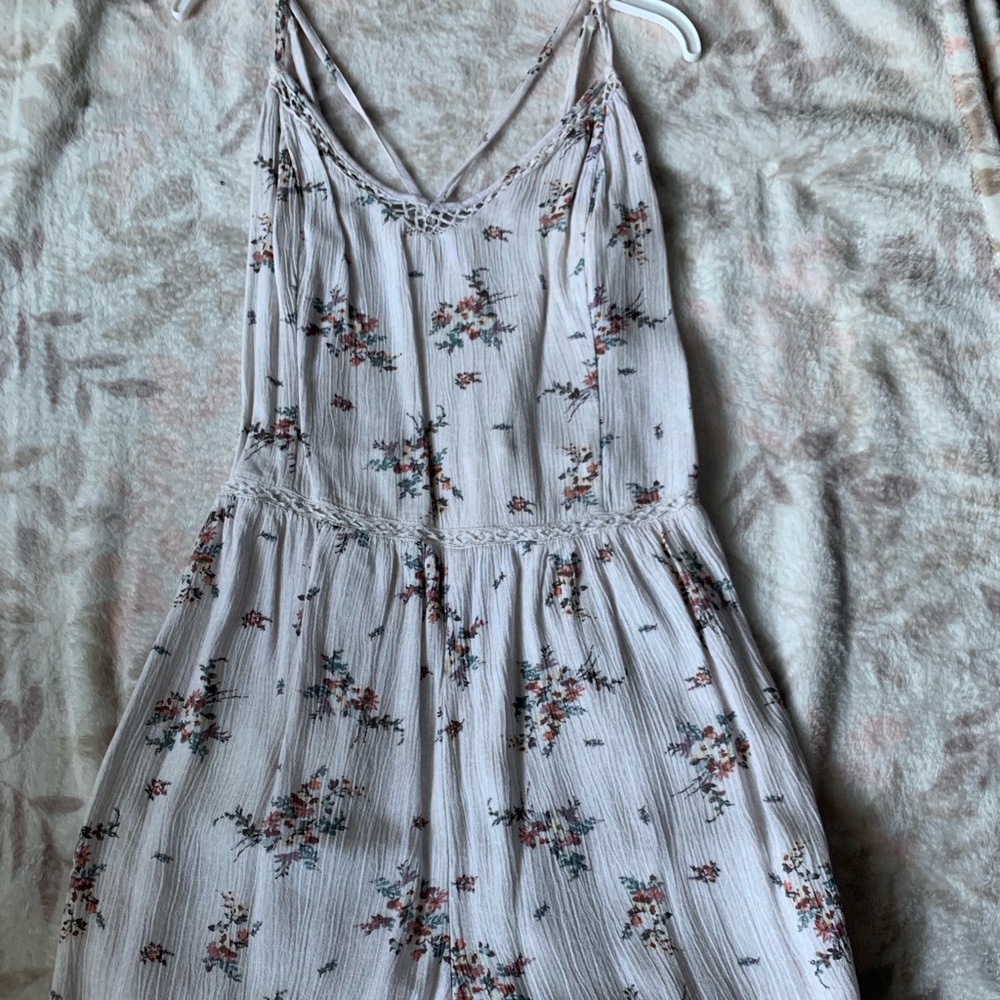 White romper with flower detailing